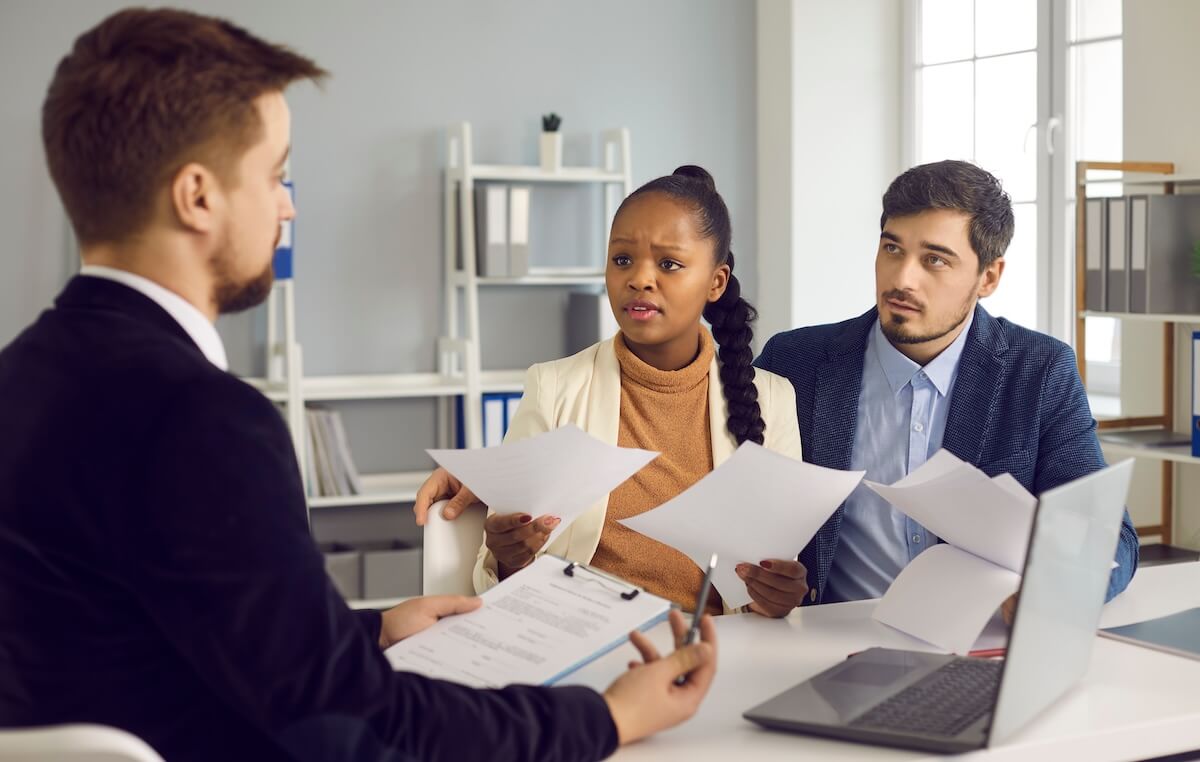 Couple talking to a lawyer