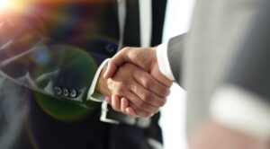 What Are the Best Timeshare Exit Companies to Trust in 2025?: entrepreneurs shaking hands