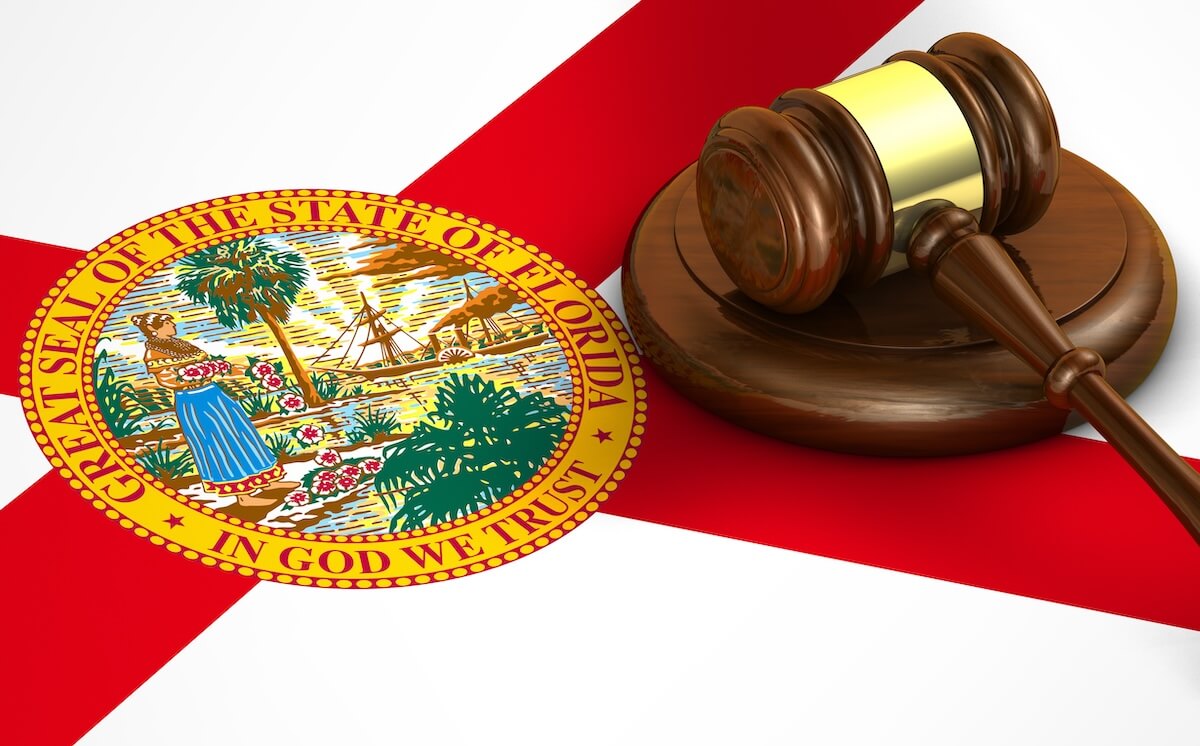 What Role Do State and Federal Laws Play in Timeshare Cancellation? Gavel and the Florida flag