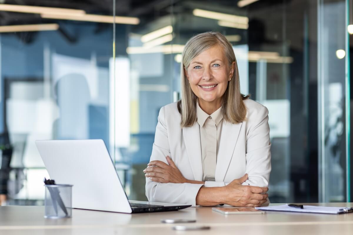 Senior entrepreneur smiling at the camera