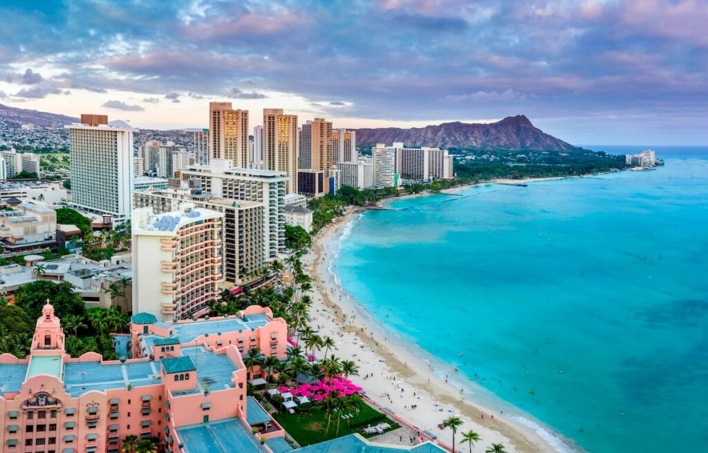 Renting out a timeshare: aerial view of a beachline and tall buildings